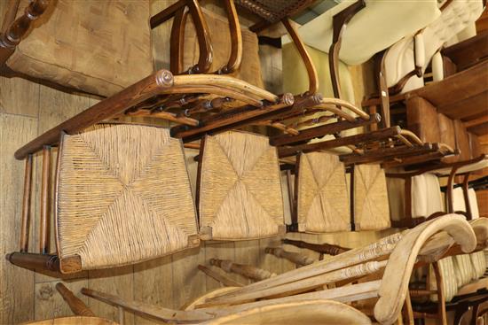 Four rush seat stick back dining chairs